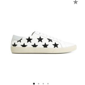 Saint Laurent leather sneakerwith star embroidery.